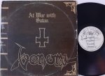 Venom   At War With Satan LP Brasil 1986 Metal Bom Estado. Gravadora Continental 80's. Capa em estado regular com amassos e desgastes em torno. Disco tem riscos superficiais. ATENÇÃO : Faixas 1 em ambos os lados estão com defeito : Pulam.