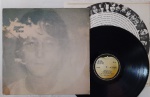 John Lennon  Imagine LP BRASIL Encarte Muito bom estado. Gravadora Apple edição 80's. Disco em muito bom estado. Capa em bom estado, com mancha amarelada. Inclui encarte.