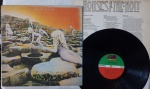 Led Zeppelin  Houses Of The Holy LP Gatefold 1973 IMPORT USA Encarte Bom Estado. LP Original Americano 70's Atlantic Records. Capa em bom estado , com desgastes na espinha, na parte da frente e contra capa. Disco em bom estado com riscos superficiais. Inclui encarte.