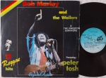 Bob Marley & The Wailers  12 Reggae Hits LP Brasil 1981 Muito bom estado. Gravadora Crazy Cat 80's. Disco em muiot bom estado. Capa em bom estado, com amassos, manchas amareladas, e desgastes onde se introduz o disco.