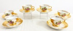 Lindíssimo e antigo conjunto constando 6 xícaras para café no estilo francês, ao gosto art nouveau, em porcelana banhadas a ouro, finamente policromada, decoradas por Cena Galante.