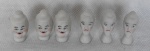 Lote com 6 cabeças de porcelana déc. 60 de bonecos dos personagens o Gordo e o Magro.