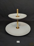 Baleiro com 2 discos em Porcelana Branca e Metal Dourado . Medida: 20 cm altura x 25 cm diametro