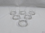 Jogo de 6 copos de whisky em cristal incolor com base padrão dedão. Medindo 9cm de altura x 8cm de diâmetro.