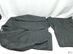 Terno Masculino Preto Tamanho 58 Médio,composto por blazer e calça. Peça ótimo tecido e não amassa.