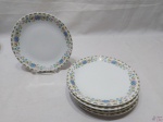 Jogo de 6 pratos de sobremesa em porcelana Renner Medaillon com barra floral. Medindo 17,5cm de diâmetro.