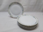 Jogo de 6 pratos rasos em porcelana Renner Medaillon com barra floral. Medindo 24,5cm de diâmetro.