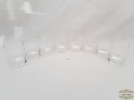 Jogo de 8 Copos Whisky  em Cristal Liso Translucido. Medida: 10 cm altura x 7,5 cm diametro. 5 Apresentam pequenos Bicados.