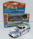 Miniatura Porsche 911 GT1  T. Boutsen / H. J. Stuck / B. Wollek - #25  die cast metal  escala 1:43 - item de coleção na embalagem original