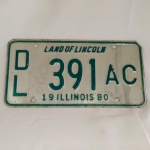 ANTIGA PLACA DE AUTOMÓVEL DO ESTADO DE ILLINOIS ESTADOS UNIDOS DA AMÉRICA DE 1980 (LAND OF LINCOLN). Mede aprox. 30 x 15,3 cm.