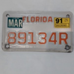 Linda placa americana de moto do estado da Florida, ultimo licenciamento em 1991,  medindo 10 x 18 cm