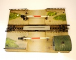 Colecionismo/ferromodelismo/brinquedos - Cancela Marklin (manufatura alemã) para trens elétricos, no sistema Marklin, na escala HO. Material em bom estado de conservação e vendido no estado que é mostrado nas fotos anexadas ao anúncio.