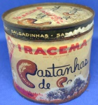 COLECIONÁVEL - ANTIGA LATA DE CASTANHAS DE CAJÚ " I R A C E M A "  DIÂMETRO: 9,1 cm E COM ALTURA DE 7,9 cm APRESENTA DESGASTES DO TEMPO