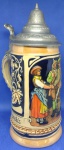 MAGNÍFICA CANECA DE CERVEJA ALEMÃ ( GERMANY ) EM PORCELANA RICA EM DETALHES, BEM ORNAMENTADA ... TAMPA EM ESTANHO ... PEÇA COM ALTURA DE 17,0 cm  DIÂMETRO BASE 7,8 cm  DIÂMETRO BOCA 5,9 cm ( DANN LOB'S -  ERST PROB'S ) PEÇA EM EXCELENTE ESTADO DE CONSERVAÇÃO