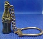 RARIDADE - ANTIGO CHAVEIRO EM BRONZE " COCA COLA " PEÇA COM 3,5 cm PESO BRUTO 20,0 g