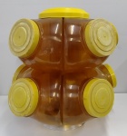 ANTIGO BALEIRO GIRATÓRIO DE DOIS ANDARES DE PLÁSTICO RÍGIDO, COM 10 GOMOS ( OBS.: UM DOS GOMOS ESTA QUEBRADO ) COM FECHAMENTO EM ROSA ... PEÇA APRESENTA DESGASTES DO TEMPO .... DÉCADA DE 70 COR AMARELO COM BEGE, PEÇA PARA DECORAÇÃO OU COLEÇÃO ... PEÇA COM 47,0 cm ALTURA E DIÂMETRO 45,0 cm
