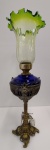 MAGNÍFICO ABAJOUR EM BRONZE E VIDRO PEÇA COM ALTURA DE 59,0 cm ( ILUMINAÇÃO NÃO TESTADA ) A PEÇA POSSUI DOIS TIPOS DE VIDROS A CLASSIFICAR , AZUL COBALTO E O VIDRO MAIOR PODE SER " MURANO ", MAS NADA DEFENIDO ... TRATA-SE DE UMA LINDA PEÇA BEM ORNAMENTADA NA PARTE DO BRONZE E DECORATIVA
