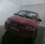 BRINQUEDOS E HOBBIES - CHEVROLET CELTA 1.0 ( 2000 ) ACONDICIONADO NO ESTOJO DE ACRILICO ESTOJO COM 15,0 cm