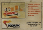 ANTIGA PLACA INDÚSTRIA OLYMPIC DE MÓVEIS LTDA EM PLÁSTICO COM DIMENSÃO DE 50 x 36 cm APROXIMADOS