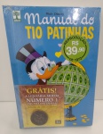 ANTIGO MANUAL DO TIO PATINHA CONTENDO A FICHA (  A LENDÁRIA MOEDA NÚMERO 1 DO TIO PATINHAS ) EDIÇÃO DE COLECIONADOR ...  NA EMBALAGEM LACRADO