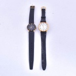 Lote contendo 2 relógios de pulso Quartz, sendo 1 Mondaine com fundo branco e 1 Mirvaine com fundo preto. Caixas 2,5 cm diametro. Pulseiras de couro. Não testados, sem garantias