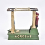 Raro e colecionável, cofre mecânico em ferro fundido lacado "ACROBAT BANK" representando uma ginasta a executar uma pirueta. Marca Hubley, Pat 6/17/1882 - (18 x 19) - Funcionando