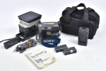 Cine & Foto - lote composto por 1 lampada  "foco de mão" 1000W VideoLux Turbo marca IEC e 1 maquina SONY Digital Mavica, com case, cabo de energia, carregador, 2 baterias e manual. Itens não testados, no estado, sem garantias futuras.  (28cm / 23cm )