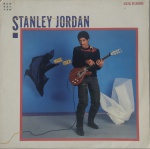LP - STANLEY JORDAN - MAGIC TUCH - 1985 - Possui riscos e necessita limpeza.
