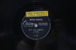 Disco 33 RPM (10") - Léo Canhôto - Não vou embora/ Núzio - Quem me dera - Marca Orion - Possui riscos e necessita de limpeza
