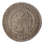 Brasil, 960 Réis, 1826R. Prata. AI P507; Lup 28T 1A (E); Levy 29.62. Sobre 8R México 1819JJ, anverso no reverso. Disco grande, bem cunhada, superfícies quase espelhadas no anverso. A moeda retém o tom original característico da prata recém cunhada. Patacão maravilhoso. Sob/FC. Ex. Coleção Vila Rica. Estimado R$ 2000,00 - 3000,00
