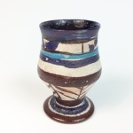 Aldemir Martins (1922-2006). Taça em cerâmica. Assinada na base e datada de 1966. 14,5 cm de altura.