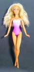 Linda e Colecionável boneca - Barbie - Mattel - Ano:2011/1991 - Made in Indonésia - Medida: 28 cm de comprimento - Conforme fotos.