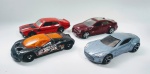 Hot Wheels -  4 Colecionáveis carrinhos - Sendo: Aston Martn One 77 - 71 Maverick G Rabber - 09 Cadillac Cts V - Ford GT 90 - Metal e plástico rígido. Conforme fotos.