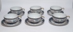 Belíssimo conjunto de 6 xícaras para chá com pires em porcelana casca de ovo, adornada com riqueza de detalhes em alto relevo representando dragão, ao fundo reproduz  imagem  de GUEIXA . Made in JAPAN - Medida da xícara: 9,5 de diâmetro x 5 de altura. Medida do Pires: 14 cm de diâmetro.
