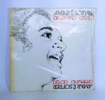 Disco de Vinil - Original - DÉCIO CARVALHO - Amar é sofrer - Possui a letra as músicas - 1987- Medida: 31 x 31 cm.