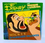 LP Compacto e Livro Educativo - Série Brinque e Aprenda Inglês - Historinha da Disney em: Mickey O Alfaiate Valente. Livro com atividades, historinha e ilustrações que ajudam e ensinam a entender o idioma Inglês. 16 páginas - Ano: 1980 - Marcou época - Medida do livro: 8,5 x 8,5 cm. Obs: possuem anotações nas atividades.