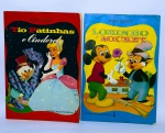 2 Antigos e raros livros: ''Tio Patinhas e Cinderela'' , Ano:1968. 32 páginas. Medida: 30 x 21 cm -- E livro: ''Lobinho e Mickey'' . Ano: 1964. 32 páginas - Walt Disney - Edições Melhoramentos - OBS: Possui anotações na primeira folha de cada livro.
