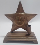 BRONZE - Antigo porta caneta e bilhete em Bronze, no formato de estrela com rosto. Mede:10 X 11 X 5 cm.