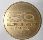 NUMISMÁTICA - Antiga e colecionável Medalha Comemorativa 50 Anos Bradesco Seguros (1935-1985) - Metal - Medida: 5,5 cm de diâmetro x 0,4 cm de espessura. O Bradesco Seguros nasceu da transferência de ações da Atlântica-Boavista Seguros.