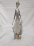 Lladro - Belíssima escultura em porcelana da renomada manufatura Lladro . Medidas: 36 cm x 10 cm.