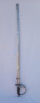 Belíssima espada da marca Corneta AEC com escudo dos Estados Unidos do Brasil em bom estado de conservação, medindo 1,01 m x 0,12 cm.