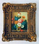 Quadro ramo de flores, pintura sobre eucatex, com belíssima moldura dourada em madeira e resina. Med. com moldura: 43x38 cm.