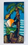 Arte Popular  Quadro em madeira entalhada, catador de coco, assinatura no verso do quadro, na madeira. Med. 40x20 cm.