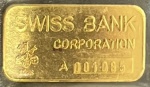 Barra de Ouro, SUÍÇA, Suíça Bank Corporation - Seriada A 001085, 1 Onça Ouro 999,9, Peso 31,1 g, Lacrada, Excelente Estado de Conservação.