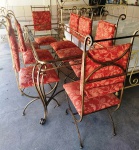 Mesa em Ferro dourado com dobramento ornamentada com 8 cadeiras de forração floral. Sem o vidro . Mede: 200x100x80  cm e cadeiras 114x82 cm