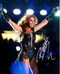 Foto autografada pela Beyonce , numerada 1045350 com  certificado. Mede: 25x20 cm
