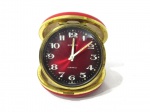 RELÓGIOS- EUROPA - Antigo relógio despertador alemão, fabricado na zona franca de manaus confeccionado em metal dourado, acondicionado em caixa original na cor vermelha articulada. medidas: diam 8 cm. não testado e sem garantia de funcionamento.