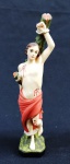ARTE SACRA, uma (1) imaginária de São Sebastião, confeccionada em estuque policromado, faltam as flechas, possui pequenos defeitos, medindo 19 cm altura.