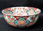 PORCELANA - Um bolw em porcelana Japonesa "Imari" policromado e esmaltado com ramos e flores, com predominância rouger de fer. Medidas alt 7,5 cm x diam 19,5.
