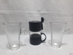 Lote composto de par de xícaras  Dolce Gusto Nescafé  em vidro  e conjunto  de xícara com coador.